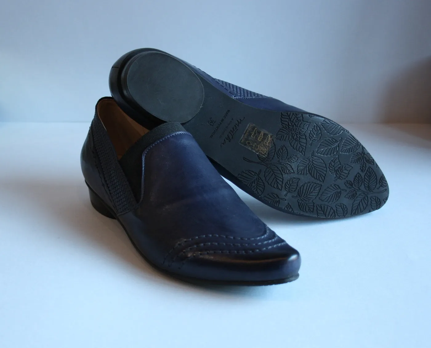 Loafer style blue flat shoes